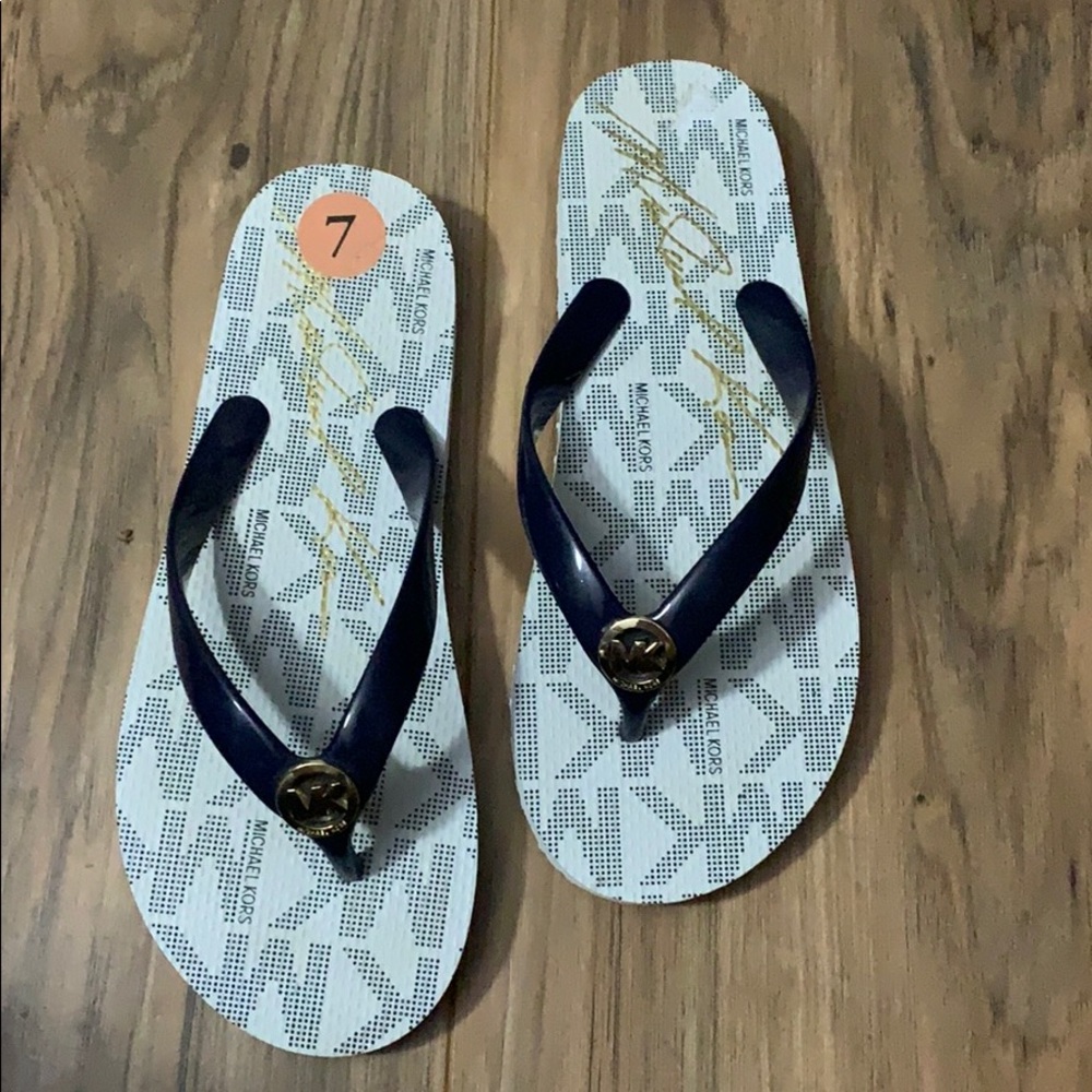 Michael Kors flip flops size 7